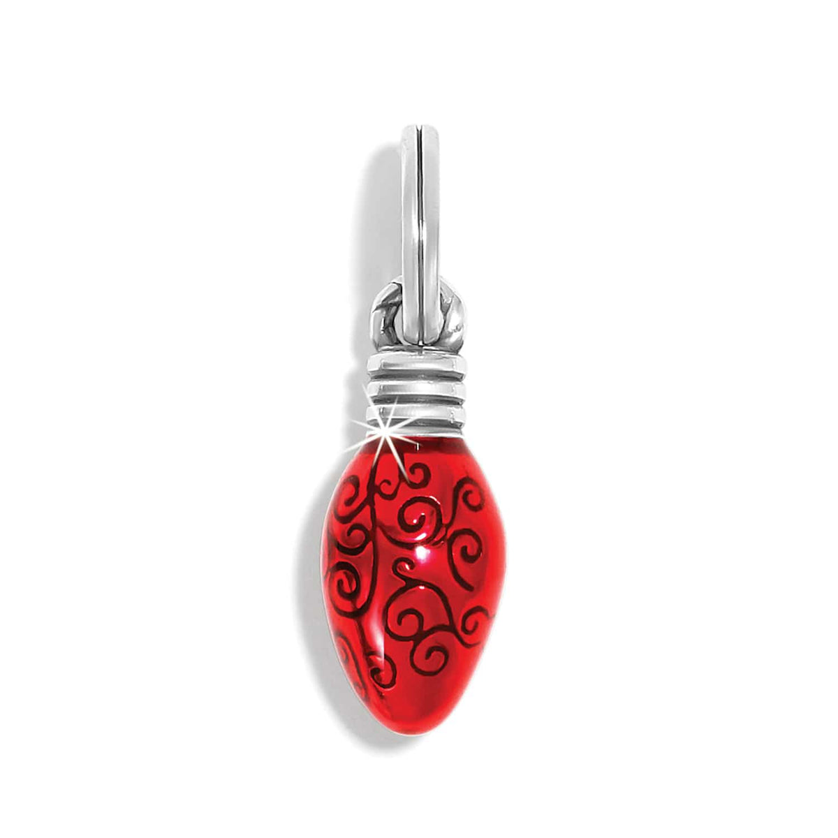 Brighton charm shaped like a red enamel Christmas light bulb with black swirl details on a white background