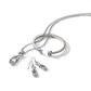 Brighton silver-plated XO necklace, drop earrings, and hinged cuff bracelet set with crystal accents on a white background
