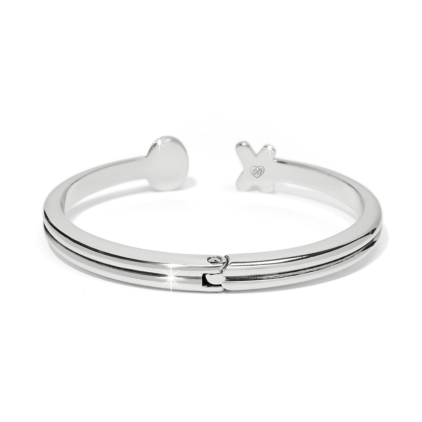Brighton hinged cuff bracelet with silver-plated finish and open ends featuring disc and X accents on a white background