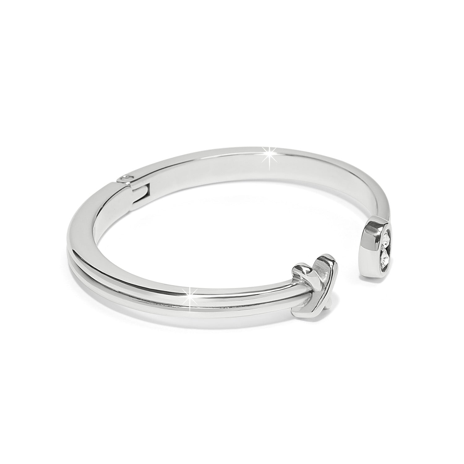 Brighton hinged cuff bracelet with silver-plated finish and crystal accent on open ends on a white background