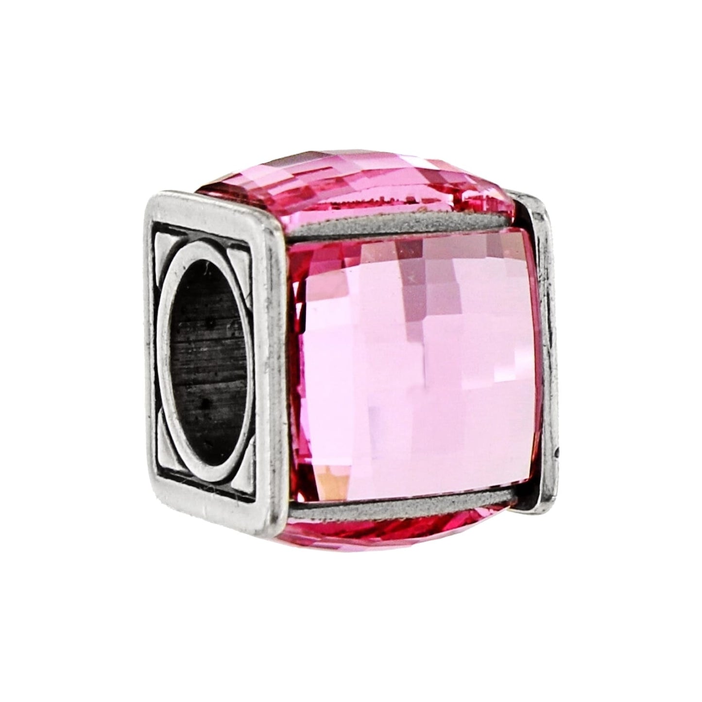 Brighton charm bead with faceted pink crystal panels and silver-plated oval-detailed frame on a white background