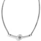 Brighton necklace with silver-tone curved bar pendant featuring a small engraved star medallion on a white background