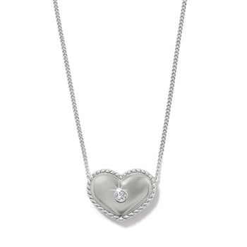 Brighton pendant necklace with silver-plated heart, rope border, and center crystal accent on a white background