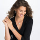 Model wearing a Brighton silver-plated medallion pendant necklace with coordinating Brighton bracelet and earrings