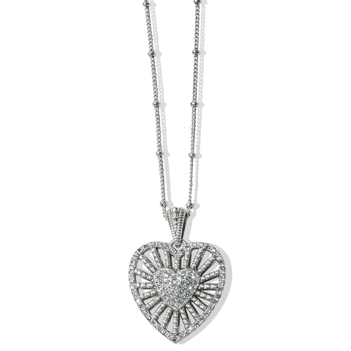 Brighton pendant necklace with silver-plated heart, crystal accents, and beaded double chain on a white background