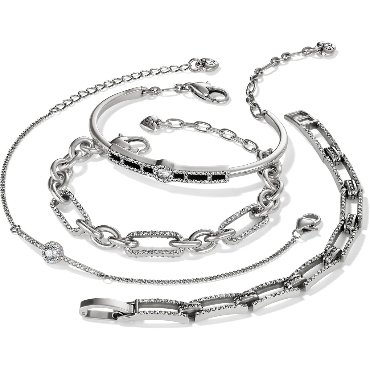 Brighton silver-plated bracelets featuring crystal-accented link, bangle, and chain styles arranged together on a white background