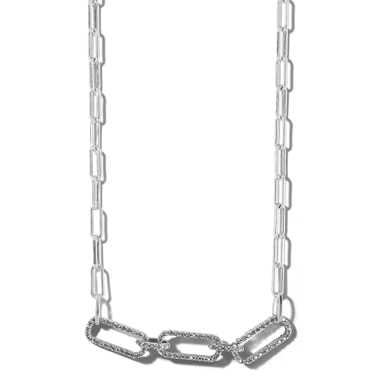 Brighton silver-plated paperclip chain necklace with crystal-encrusted linked stations at the center on a white background