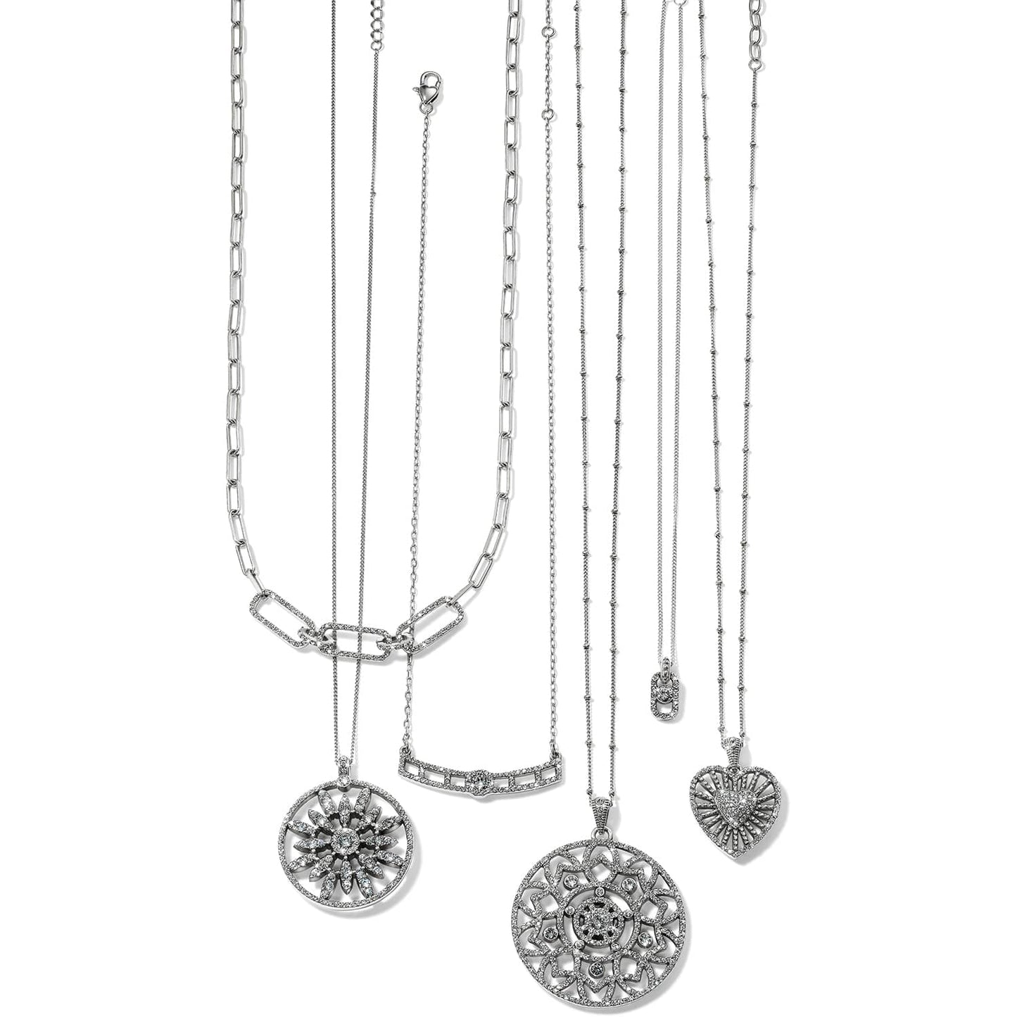 Brighton silver-plated necklaces with crystal pendants featuring floral medallion, bar, and heart designs on a white background