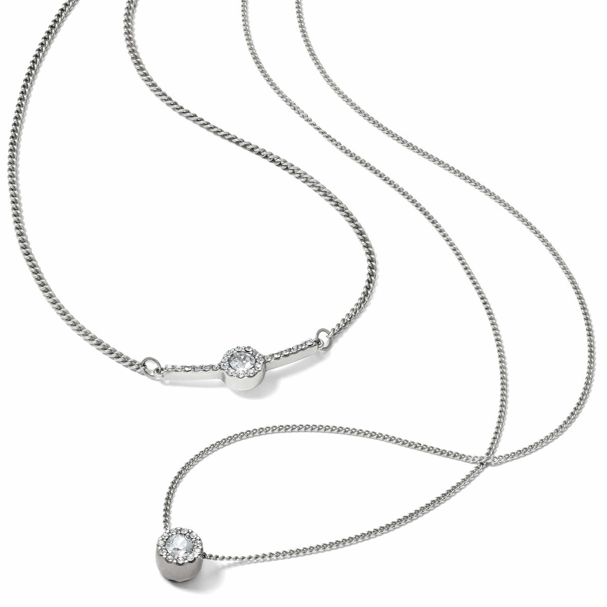 Brighton layered chain necklace with two silver-tone crystal halo pendants and curb chain on a white background