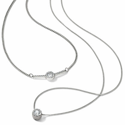 Brighton layered chain necklace with two silver-tone crystal halo pendants and curb chain on a white background