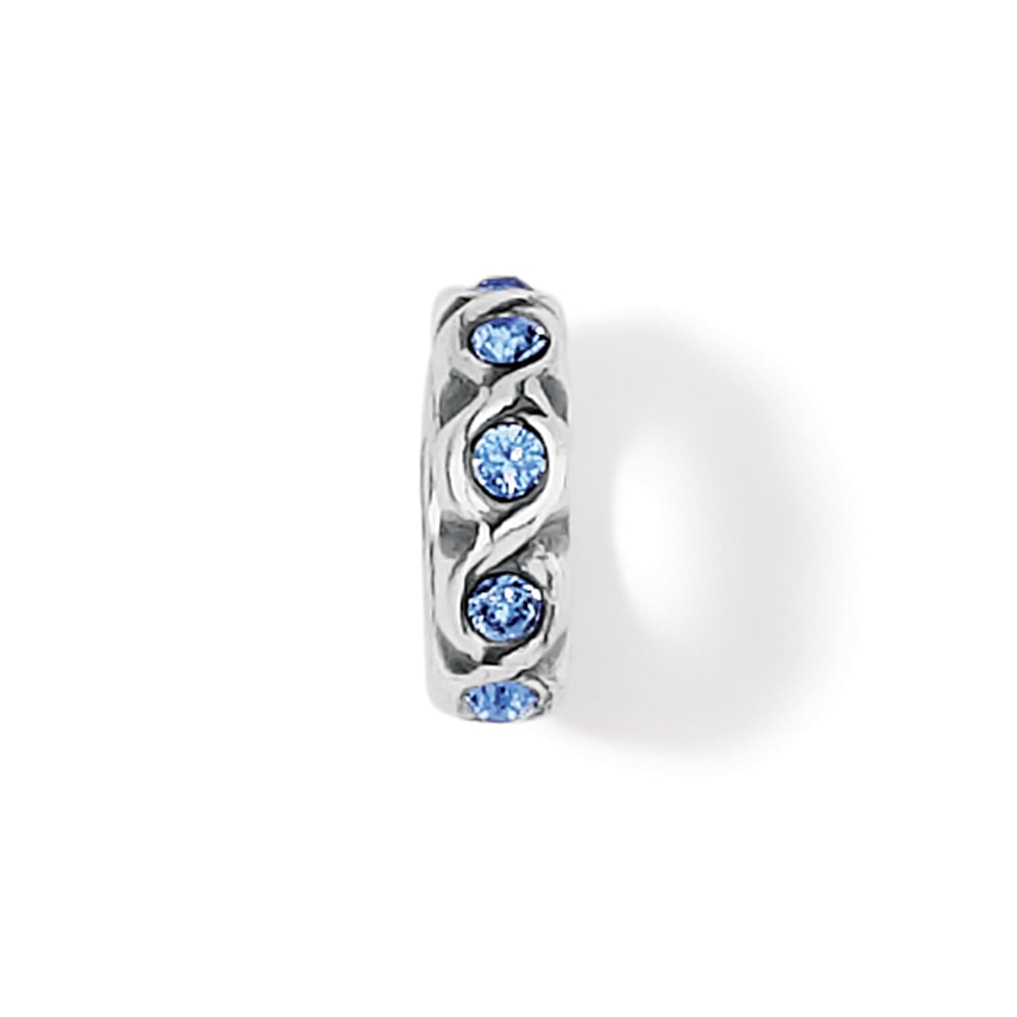 Brighton spacer charm with silver-tone braided design and blue crystal accents around the band on a white background