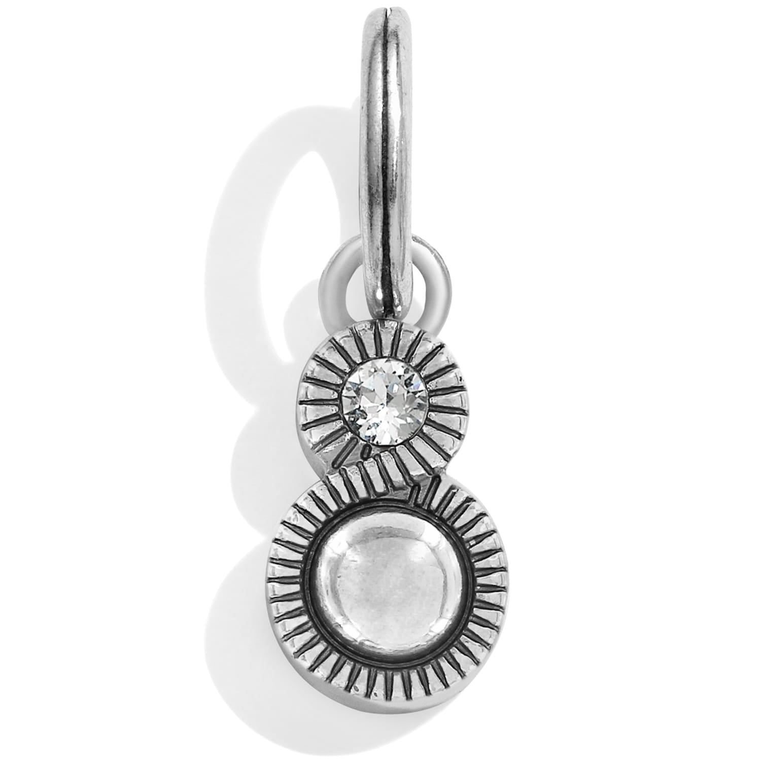 Brighton silver-plated charm with two round medallions featuring crystal accent and sunburst engraved detail on a white background
