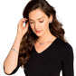 Model wearing Brighton silver-plated jewelry set with crystal stud earrings, beaded pendant necklace, and matching bracelet