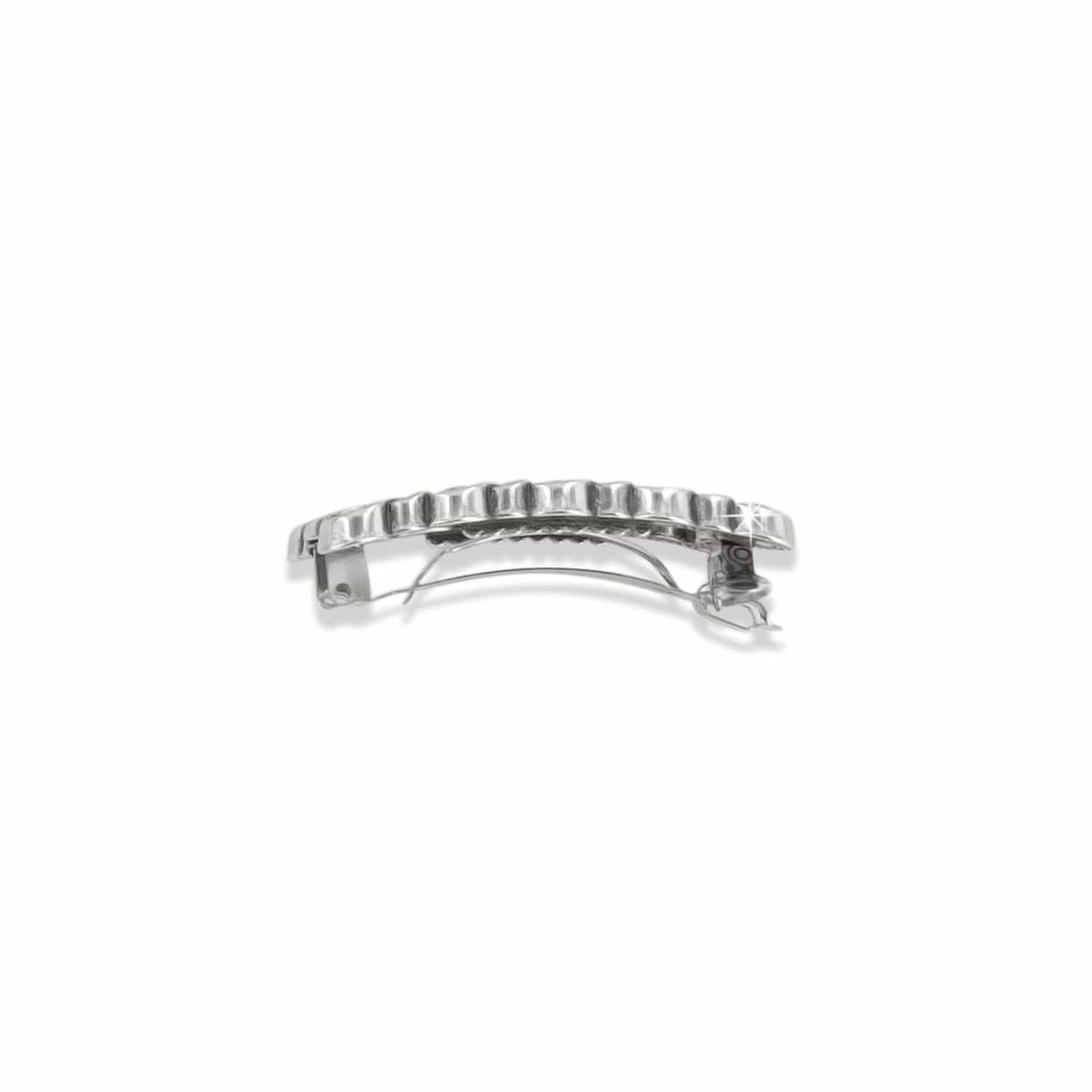 Brighton hair barrette shown from the back with silver-plated ridged bar and hinged clasp mechanism on a white background