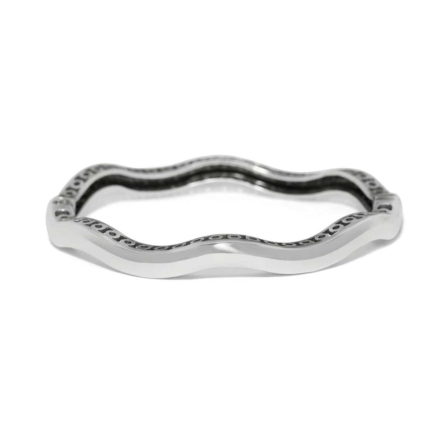 Brighton bangle bracelet with silver-plated wavy design and decorative openwork inner detailing on a white background