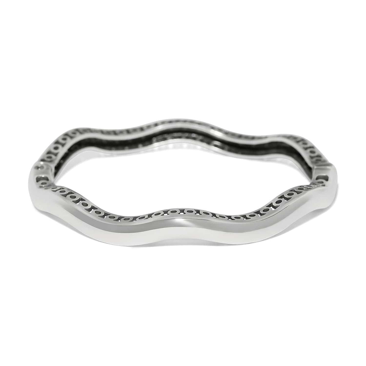 Brighton silver-plated bangle bracelet with wavy scalloped design and openwork interior detailing on a white background
