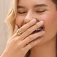Model wearing a Brighton two-tone ring with wavy gold bands and silver center detail
