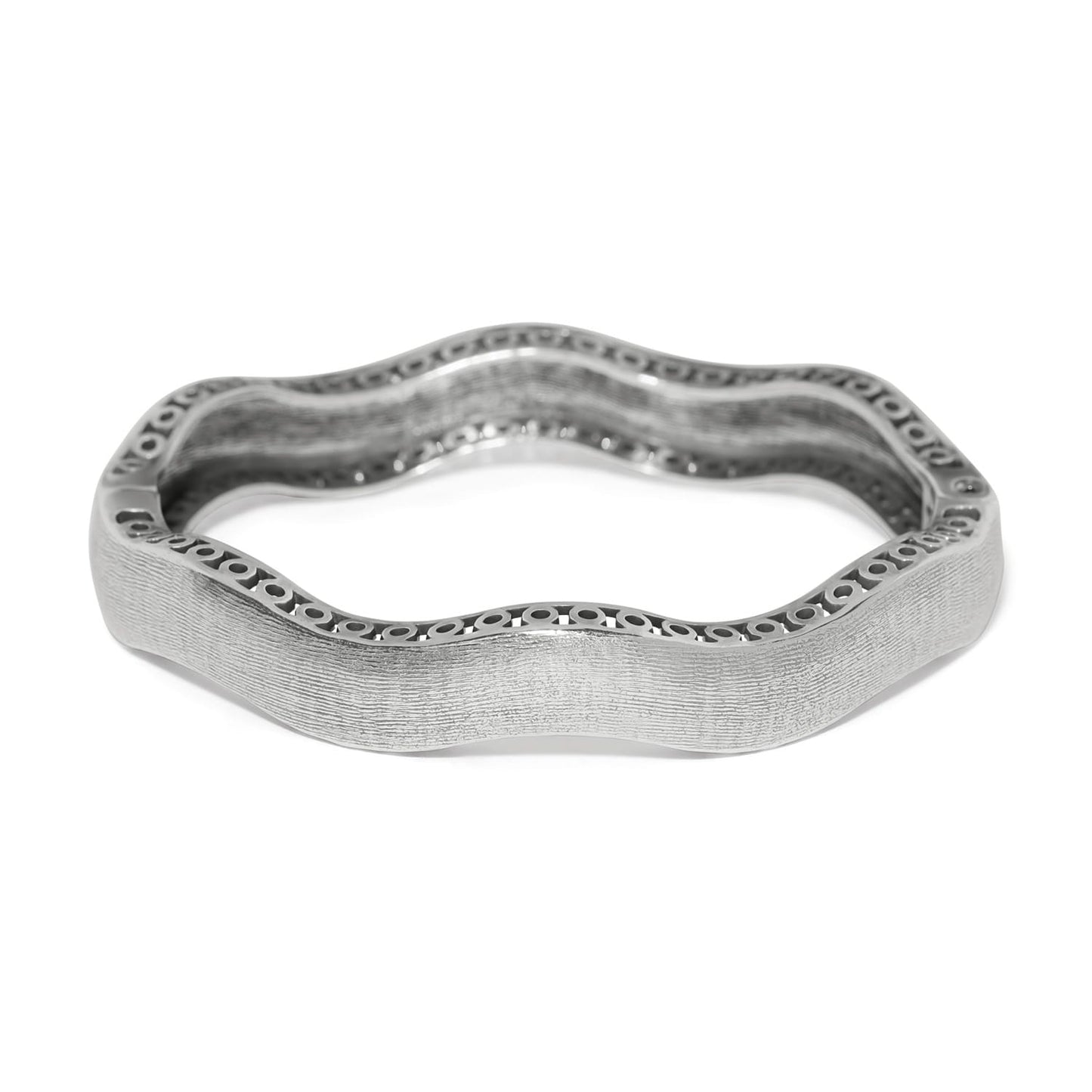 Brighton bangle bracelet with wavy silver-plated design, textured finish, and openwork edge detail on a white background