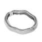Brighton bangle bracelet with silver-plated wavy design, textured exterior, and scrollwork openwork along inner edge on a white background