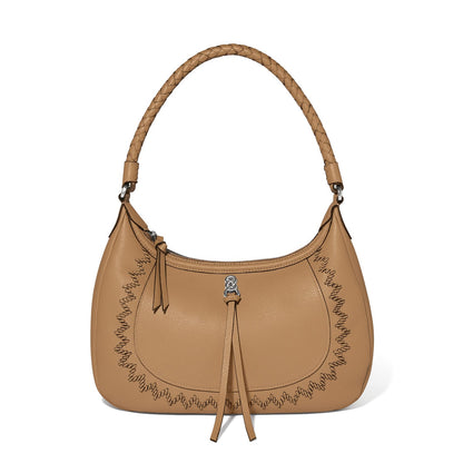Brighton shoulder handbag in tan leather with braided handle, whipstitch trim, and knotted tassel accent on a white background