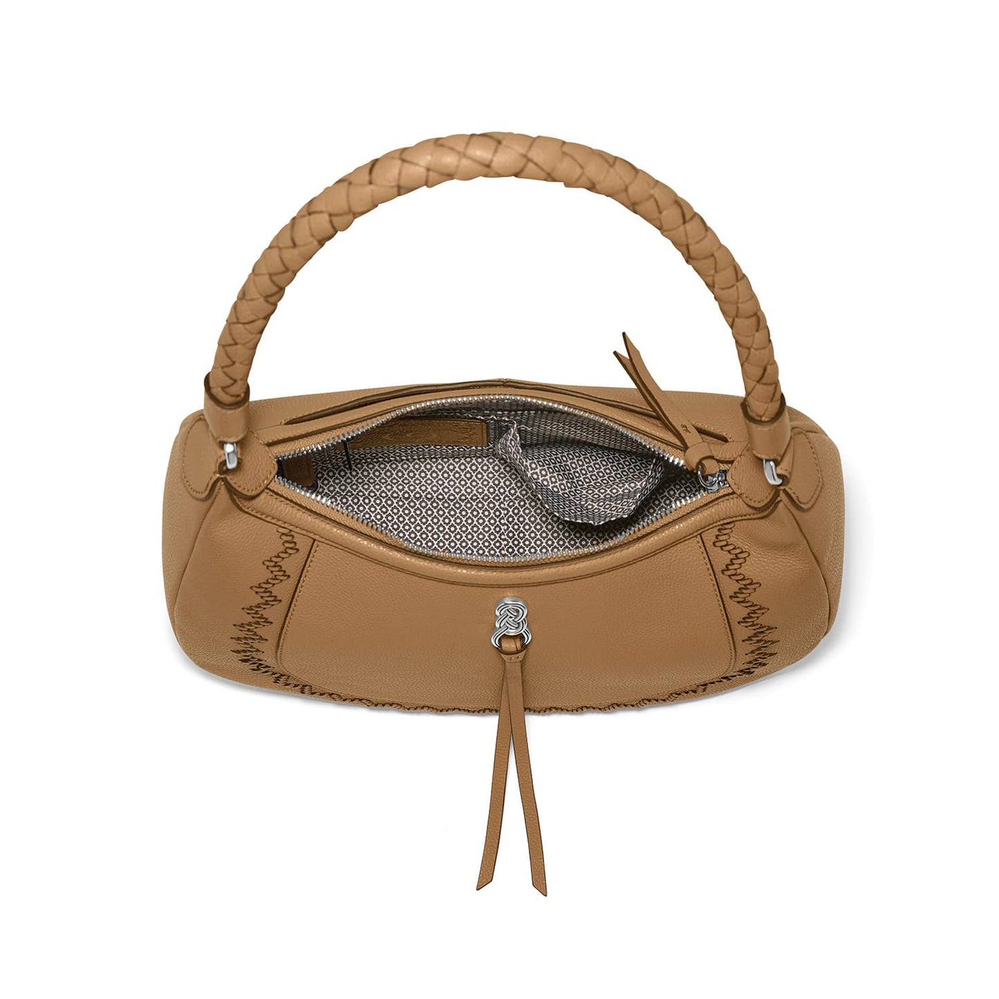 Brighton tan leather handbag shown open with braided top handle, patterned interior lining, and silver-tone knot charm on a white background