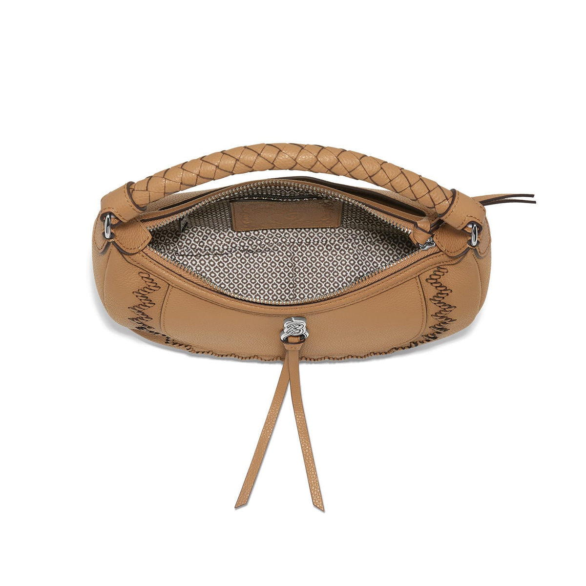 Brighton tan leather handbag shown open with patterned interior lining, braided handle, and leather tassel on a white background
