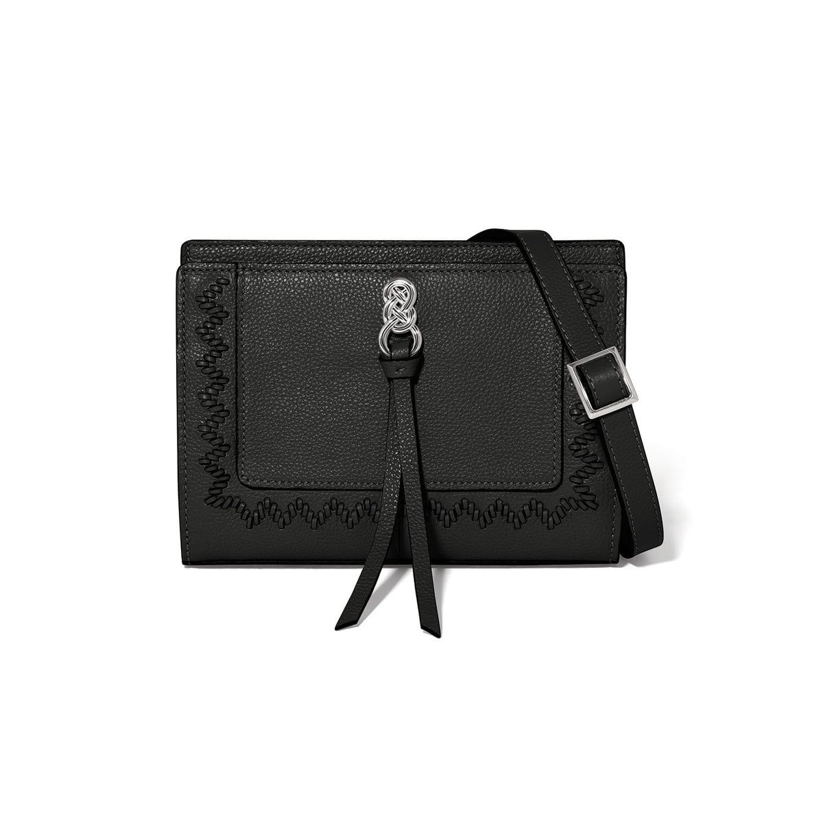 Brighton black pebbled leather crossbody handbag with silver-tone knot accent, leather tassel, and whipstitch trim on a white background