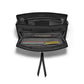 Brighton black leather handbag shown open with patterned interior lining, card slots, and zippered pocket on a white background