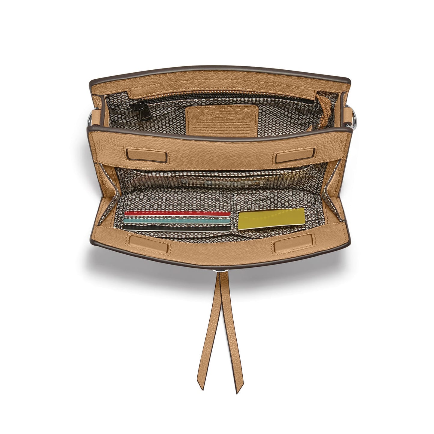 Brighton tan leather handbag shown open with patterned fabric interior, card slots, and zip pocket on a white background