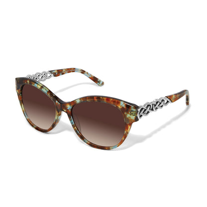 Brighton cat-eye sunglasses with blue and brown tortoise frames, silver-tone braided temple accents, and gradient brown lenses on a white background