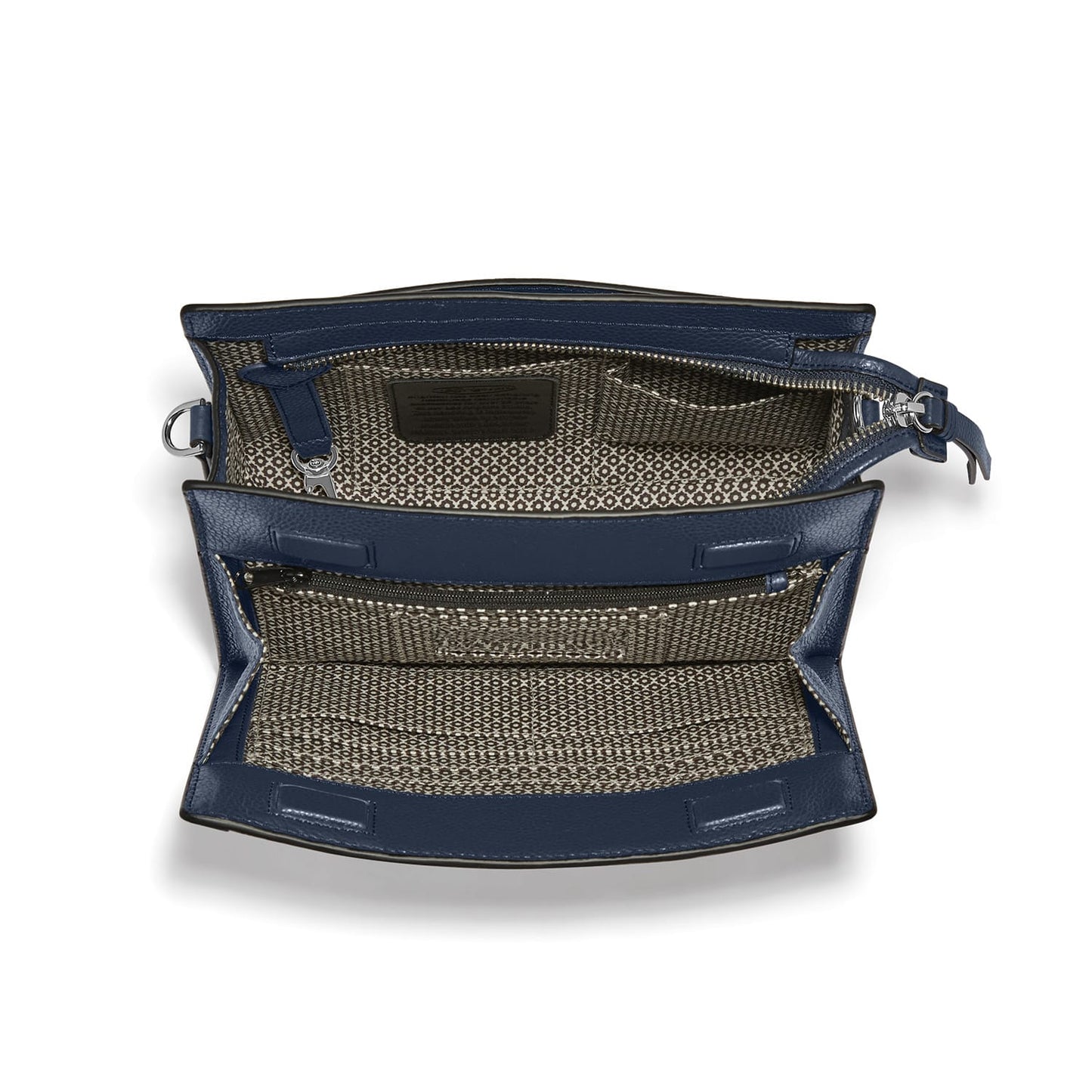 Brighton navy leather handbag shown open with patterned fabric interior, zip pocket, and silver-tone hardware on a white background