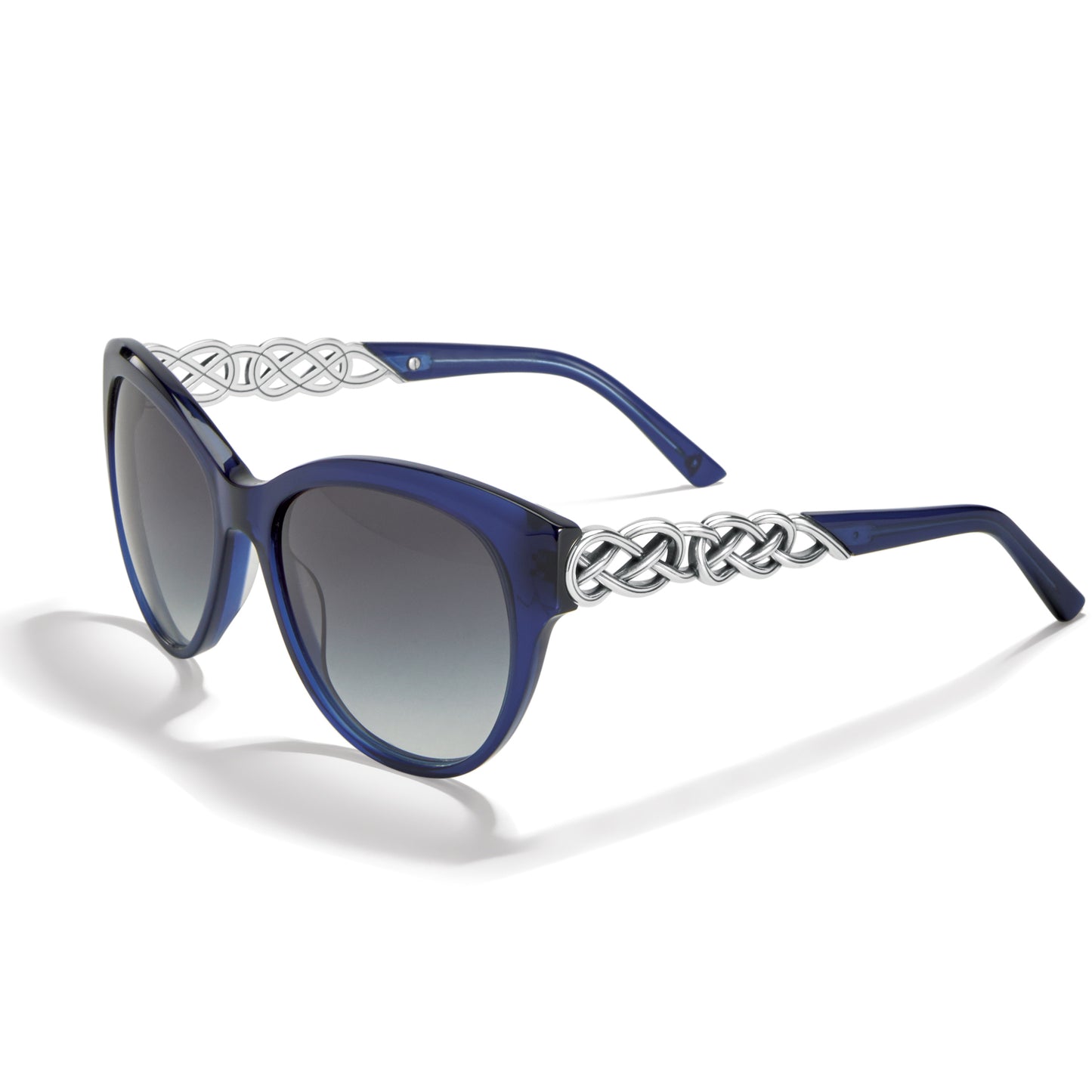 Brighton cat-eye sunglasses with blue frames, gradient lenses, and silver-tone Celtic knot temple accents on a white background