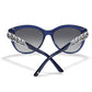 Brighton sunglasses shown from the back with blue frames and silver-tone braided chain temple detail on a white background