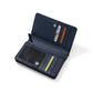 Brighton navy leather wallet shown open with card slots, ID window, and snap closure on a white background