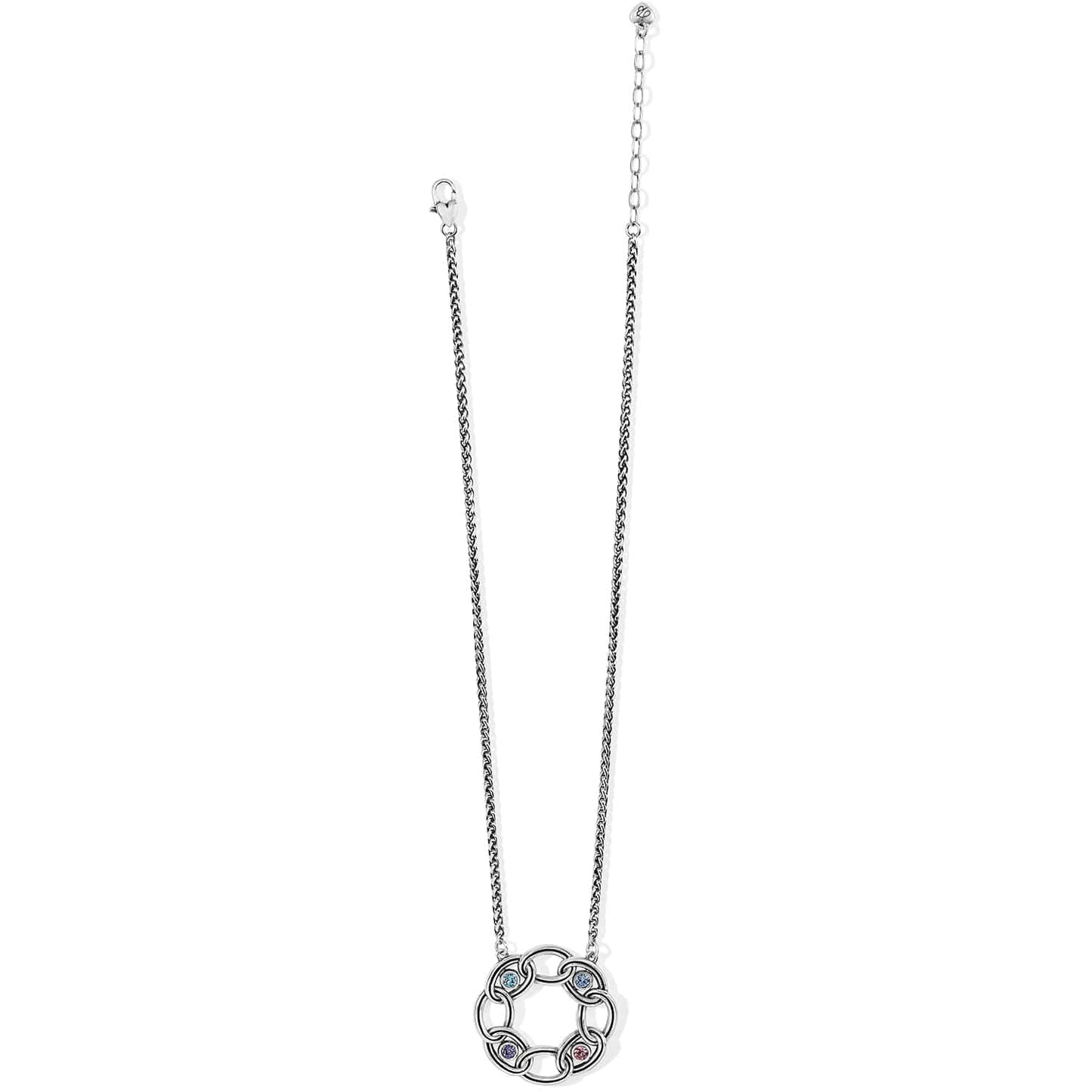 Brighton silver-plated necklace with circular link pendant featuring pastel crystal accents and lobster clasp on a white background