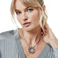Model wearing a Brighton silver-plated pendant necklace with interlocking circular links and multicolored crystal accents