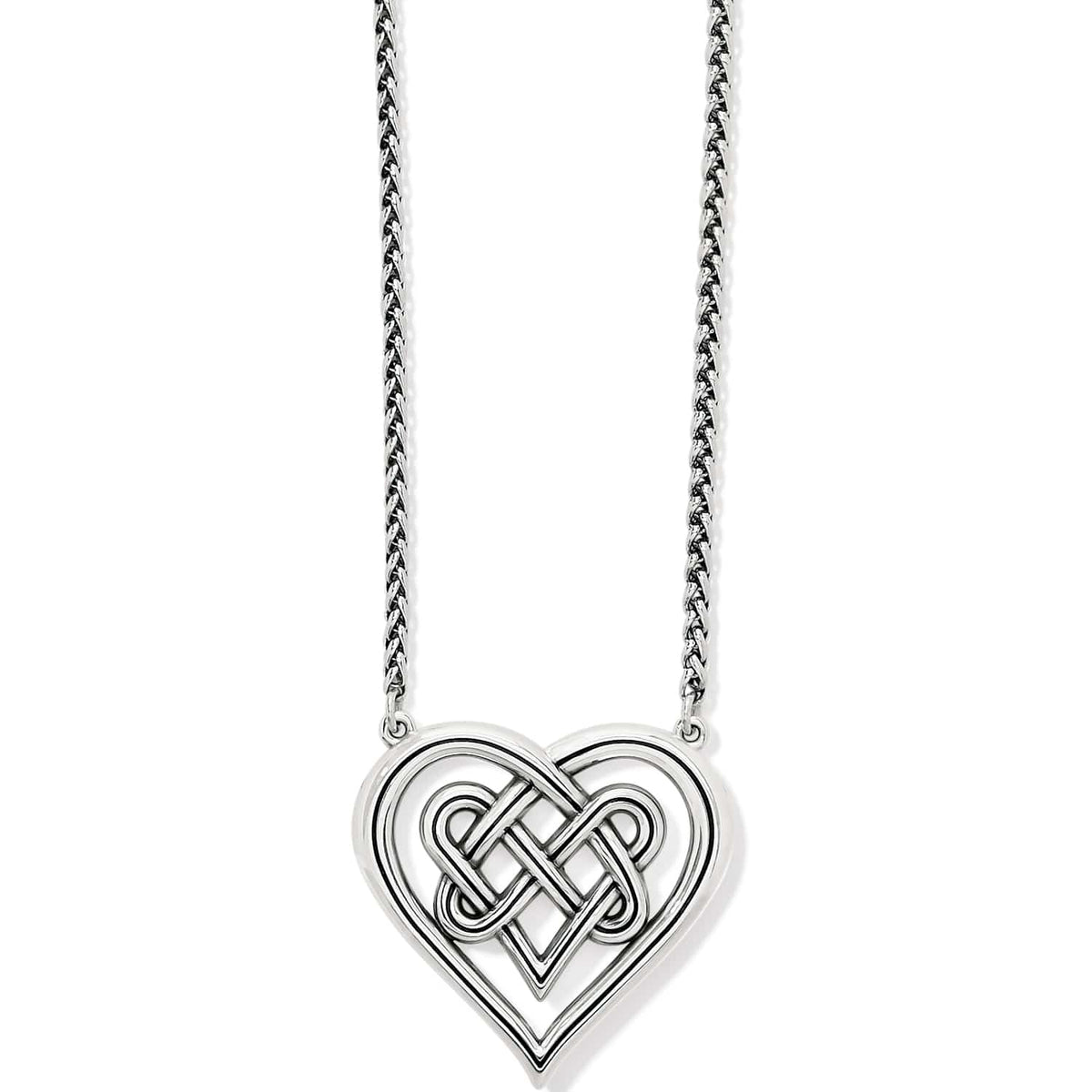 Brighton pendant necklace with silver-plated interwoven Celtic knot heart design and wheat chain on a white background