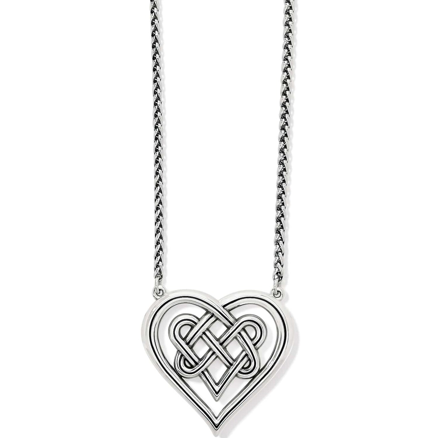 Brighton pendant necklace with silver-plated interwoven Celtic knot heart design and wheat chain on a white background