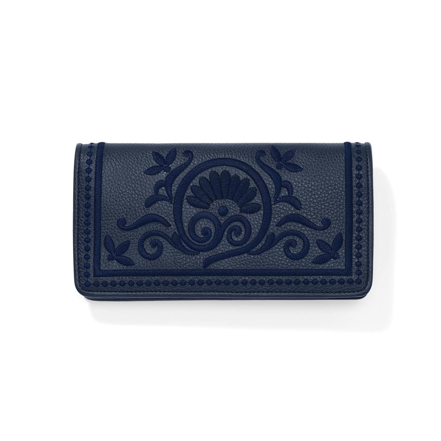 Brighton wallet in navy pebbled leather with tonal embroidered floral scroll medallion and dotted border on a white background
