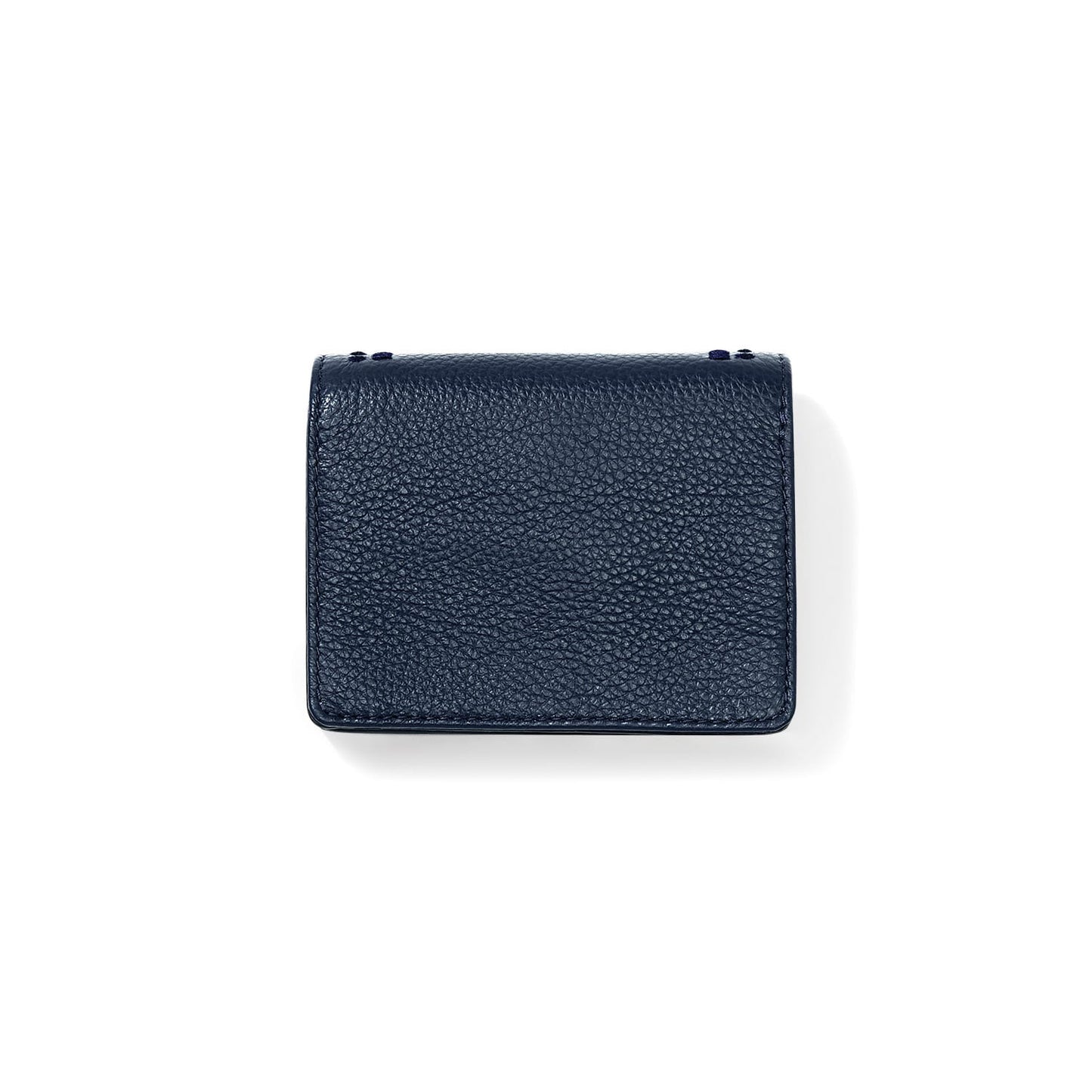 Brighton wallet shown from the back in navy pebbled leather with stitched edges on a white background