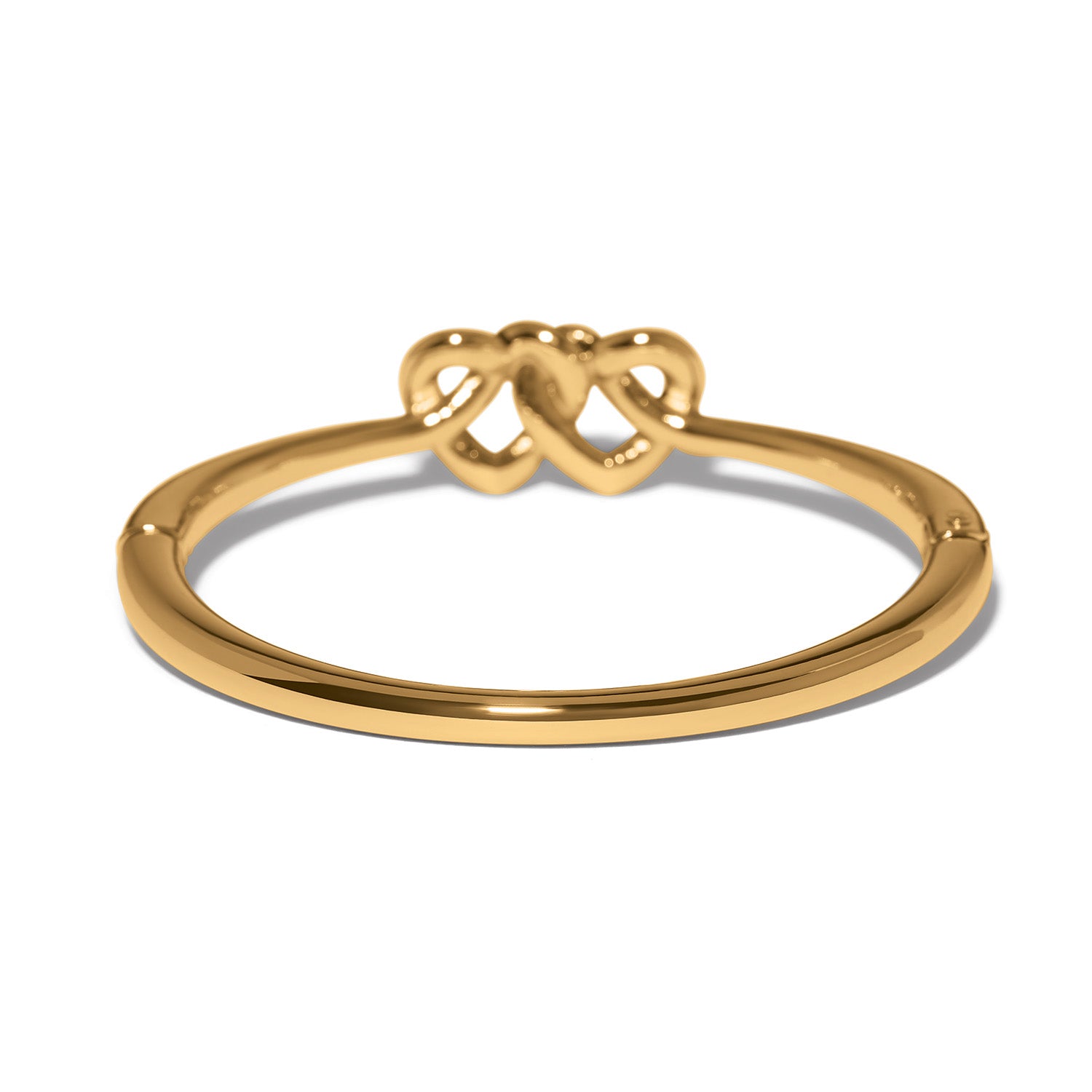 Brighton gold-plated ring shown from the back with interlocking double heart design on a white background