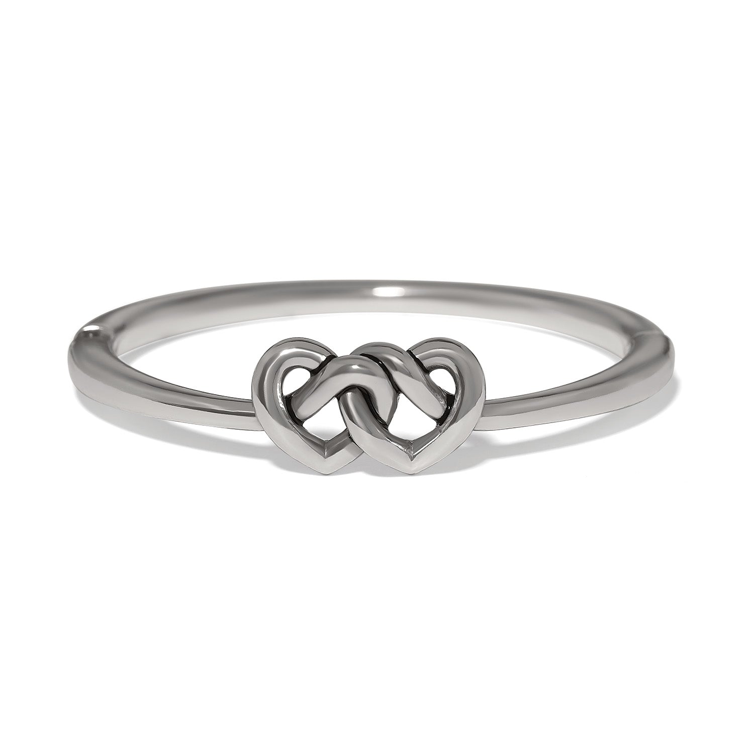 Brighton ring with silver-plated band featuring two interlocking heart motifs at the center on a white background