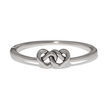 Brighton ring with silver-plated band featuring two interlocking heart motifs at the center on a white background