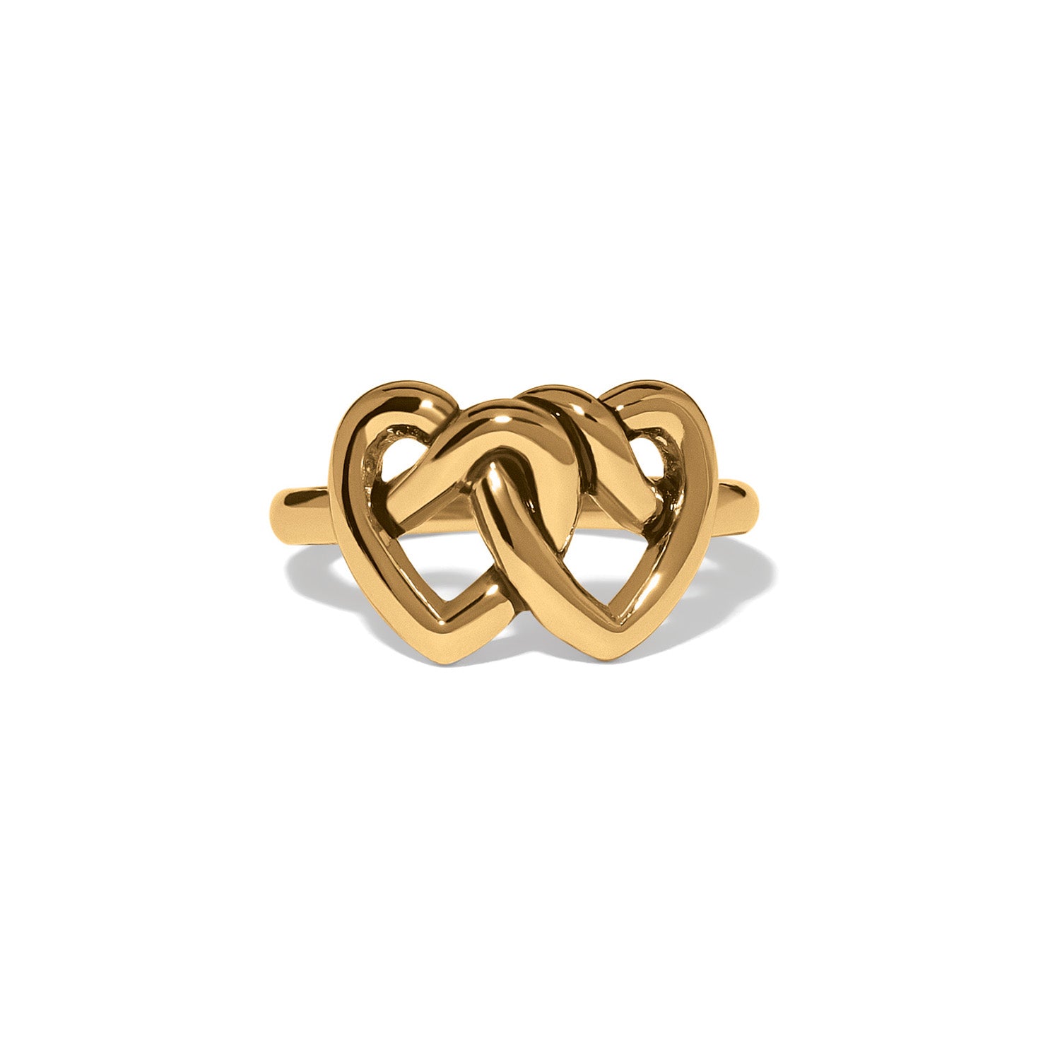 Brighton ring with two interlocking gold-plated hearts forming a knot design on a white background