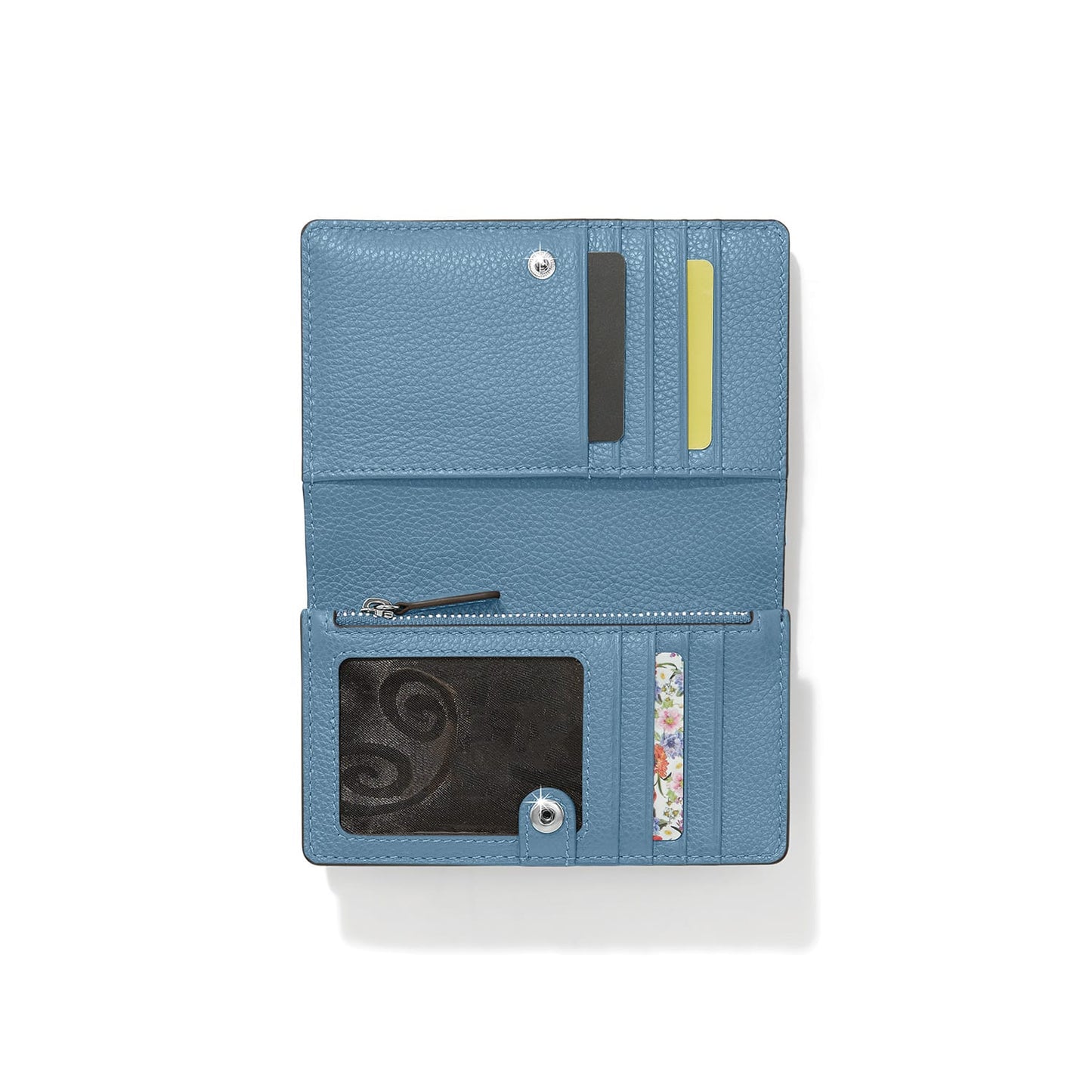 Brighton blue pebbled leather bifold wallet shown open with card slots, zippered pocket, and ID window on a white background