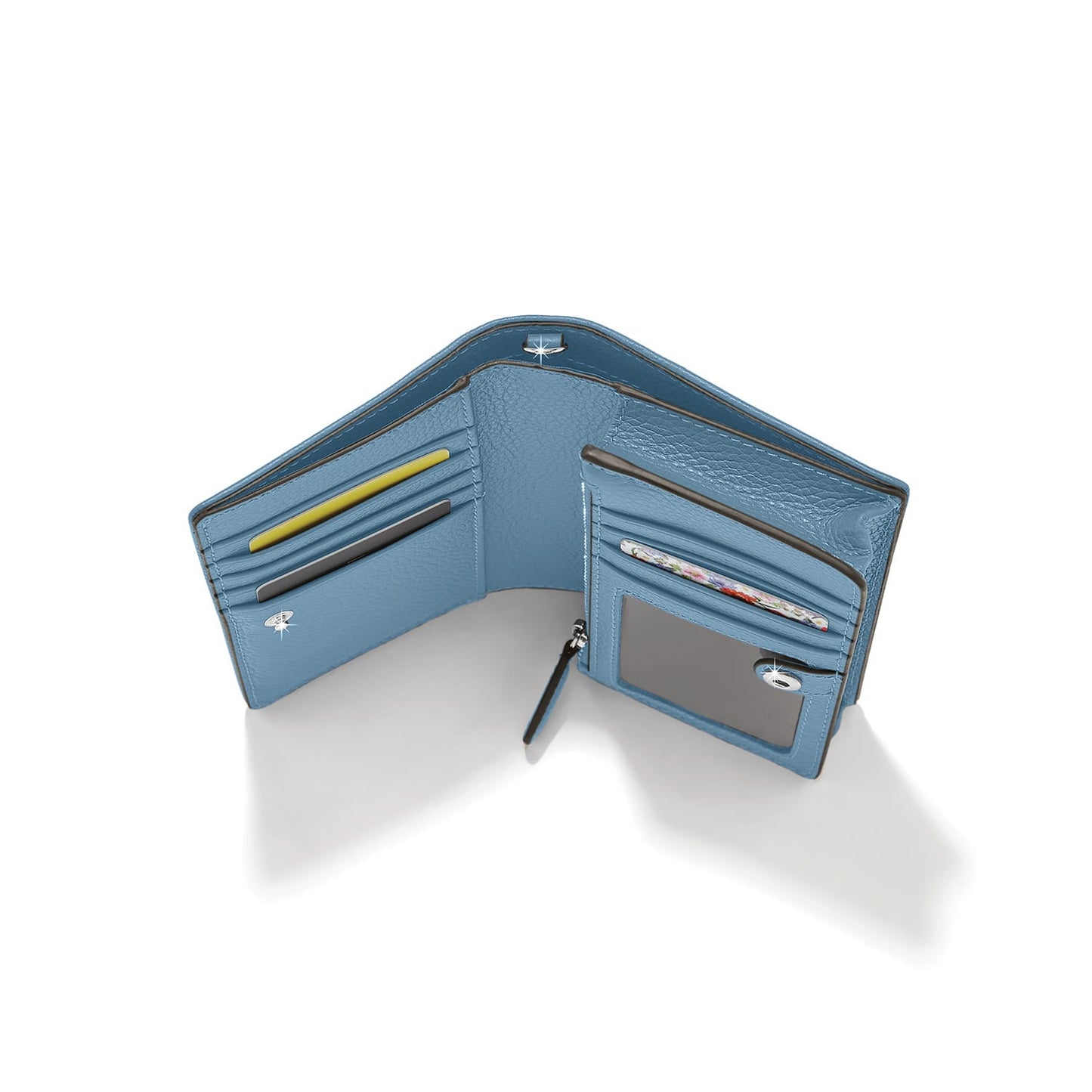 Brighton bifold wallet shown open with blue leather interior, card slots, and clear ID window on a white background