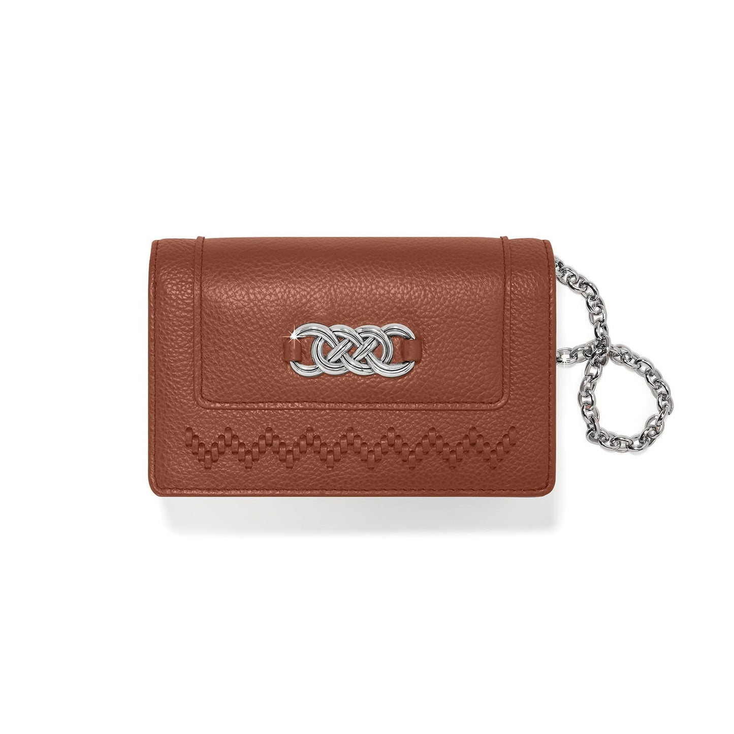 Brighton brown leather wallet with silver-tone interlocking knot emblem, woven trim, and chain wristlet on a white background