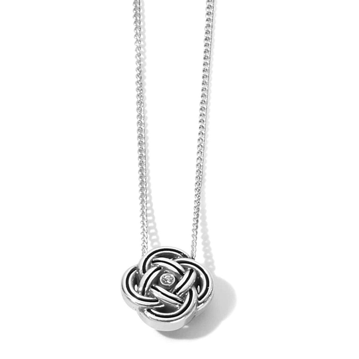 Brighton pendant necklace with silver-plated Celtic knot design and small crystal accent on a white background