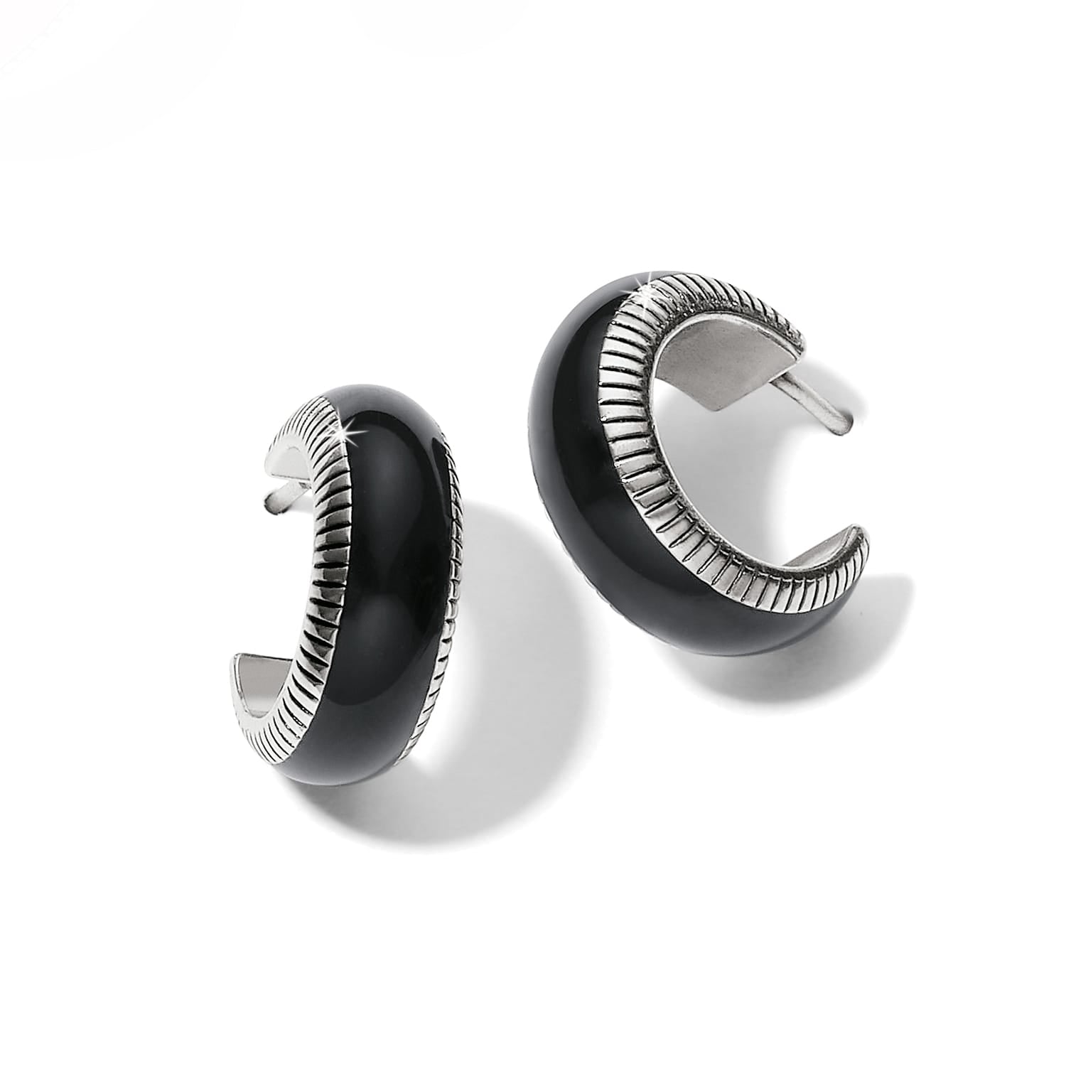 Brighton hoop earrings with black enamel and silver-plated ribbed edge detailing on a white background