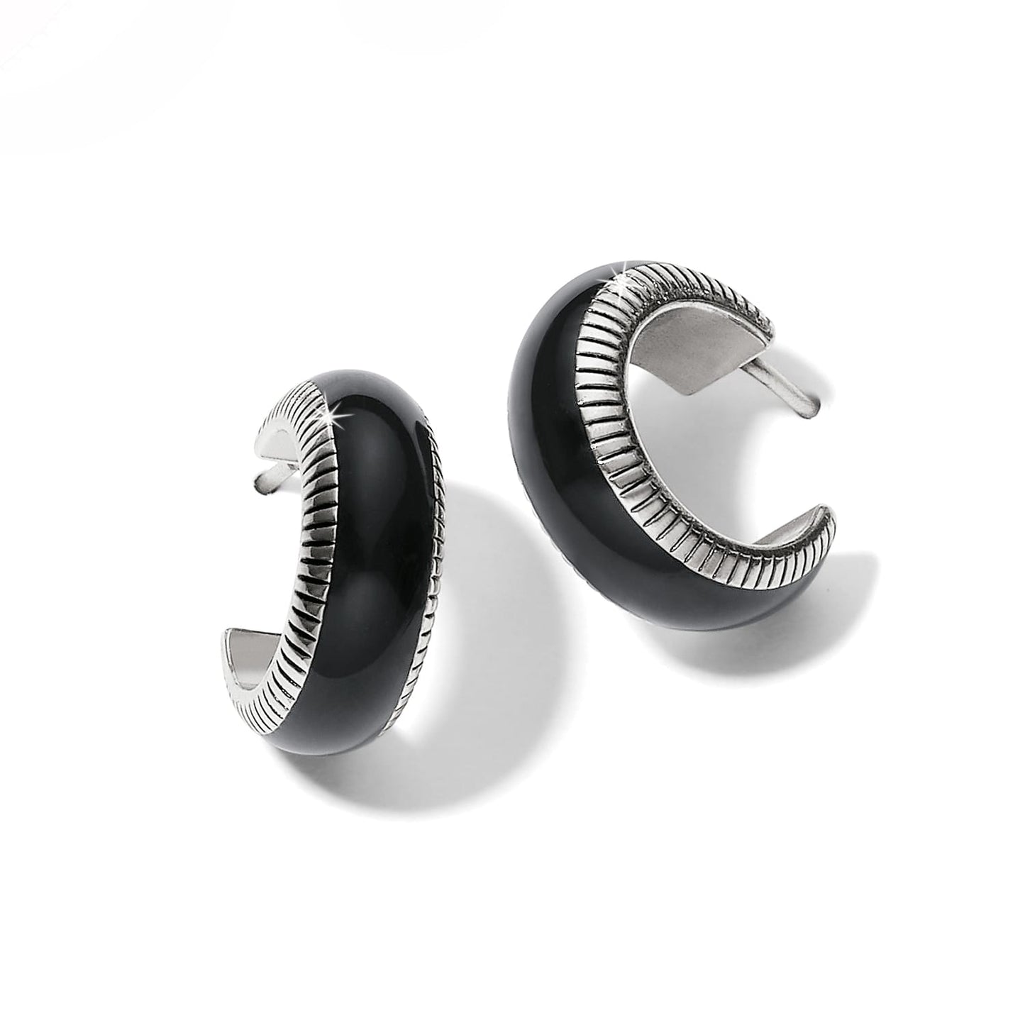 Brighton hoop earrings with black enamel and silver-plated ribbed edge detailing on a white background